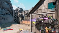 Use the car to jump on to the roof of the garage here