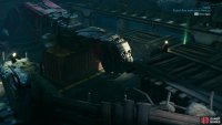 Use the mechanical arm to move a shipping container,