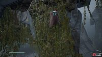 Use the vines to climb onto the top of the AT-AT and then drop inside