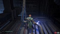 Use the large container to let you reach the platform above and then cut the wire
