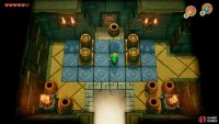 Enter the Key Cavern and pick up a Vase and launch it at the door to get past,