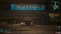 Find a toppled vending machine under the “Aesculapius Inc.” sign,