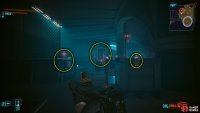 Distract the guard by hacking the machine in the middle. Grab them, and throw them in the dumpster to the left.