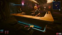Take a seat at the bar, and order a drink if you want while you wait for Reed.