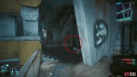The machine can be found behind the couch, and skull graffiti.