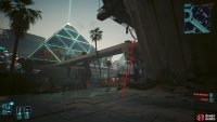 Climb the scaffolding onto the path, and follow it to the building missing half the tower.