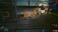 Move the dumpster to reveal a gap in the fence (Body 9), drop, and head left to the end of the platform.