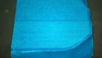 whilst the fake is bright blue.