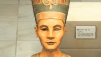 The real sculpture has no long earrings