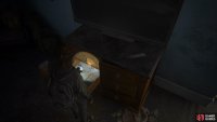 Once you’ve made into the building past the Fuck Fedra Gate, head upstairs to find an Artefact in the drawer under the TV