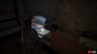 Open the shutter to find a Trading Card under the counter