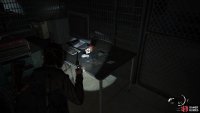 Crawl under the fence at the back of the room to find a Trading Card