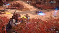 Aim your Shock Warrior Bow at the Power Cell on the back of the Scrounger