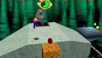 You need to press the purple button to grab the first coin