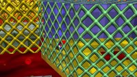 The fourth coin is underneath the stone elevator