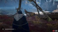 You’ll need to approach the chest from the north and through the totems to be able to access it.