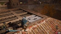 You can enter the building from the roof by smashing the wooden planks.