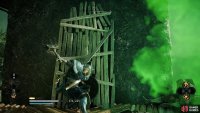 Break the wooden planks to reveal the grip in the wall that you can use to climb the tower.