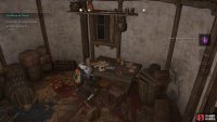 You’ll find the clue in on a table in one of the burned houses.