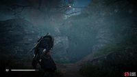 You’ll find the entrance to the cave as you approach from the east.