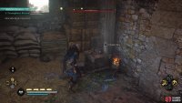 Collect the key from the nearby table, used to open a door below.