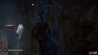 Jump to the object in the hand of the statue.