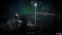 Use your torch to disperse the poison, then destroy the wooden planks blocking entrance to the well.