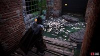 Dive under the water to swim to a hidden passage, leading to the main room of the Bureau.