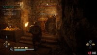You’ll find the Book of Knowledge in a hidden room by jumping down into it beyond the doorway. 