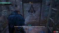 Interact with the door to open it with your Hidden Blade.