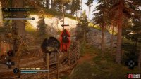 Kill the guard at the top of the platform, then hide behind the tree trunk and sacks.