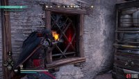 Enter the left building by shooting the lock of the front door.