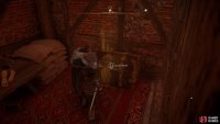 You can loot the chest behind the wooden barrier.