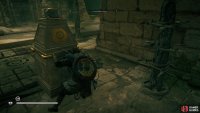 You can move the second stone pillar through the space where the gate was, avoiding the spikes along the way.