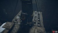 You’ll need to push the stone block onto the platform to raise the gate.