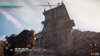 Shoot the link to release the logs, killing the guards in front of the entrance to the church.