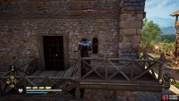 Shoot the lock on the door on either the eastern or western side to enter.