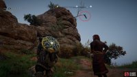You’ll be able to loot the arrow from the top of the cliff, as circled here.