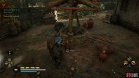You’ll find plenty of fire pots surrounding a nearby well.