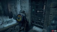 Use the key to unlock the door, then push the stone pillar through.
