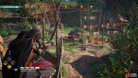 Use the rope system to reach the building and take out any guards along the way.