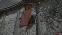 you’ll need to head through an open window up the wall to access the building where the armor is kept.