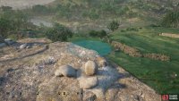 First, find the largest rock and rotate it so it’s sitting taller.