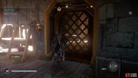 Then head to the second tallest building and use the key to unlock the door to where you’ll find the chest.