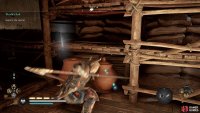 Head up onto the upper floor and smash the pots to reach a secret area.
