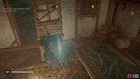 you’ll need to grab the key from beneath a moveable obstacle in the outhouse.