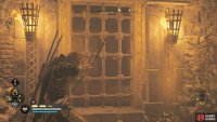you’ll need to shoot a lock on a barred door from the outside of the church to reach the room where the armor is kept. 