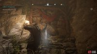 You’ll need to smash through the breakable stone wall to reach the artifact.