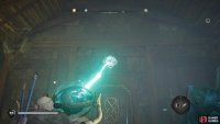 First head upstairs and use the projector to open up a door behind you to obtain the projector orb. 