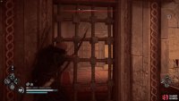 You’ll first need to enter the main abbey and shoot the door lock through the bars.
